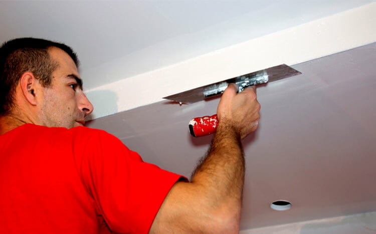 Ceiling repair red t shirt