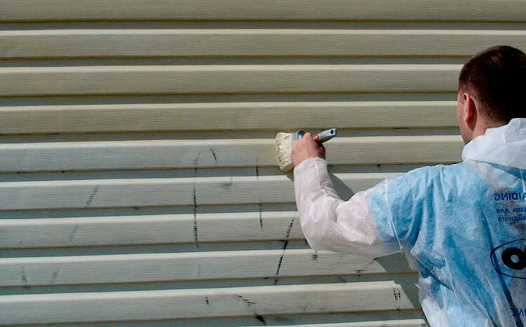Do you spray or hand paint vinyl pro paint siding