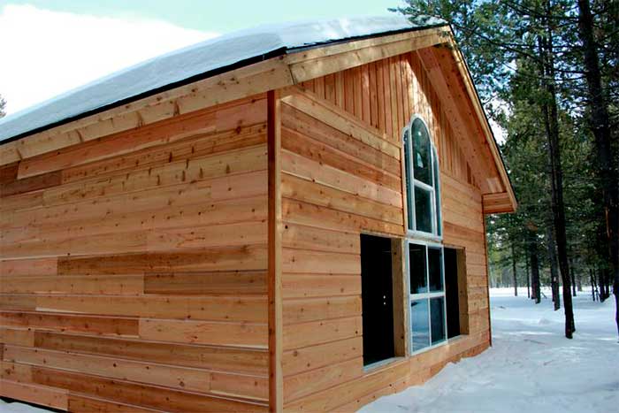 ENGINEERED WOOD wood house in the forest