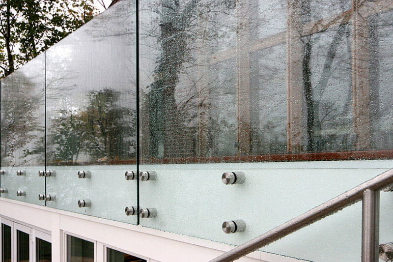 Point glass railing system