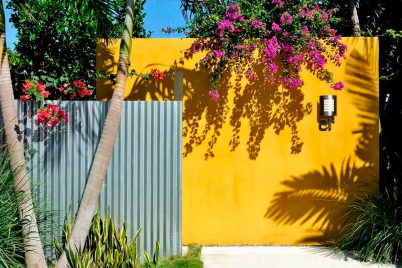 Corrugated Metal Fence and Colorful Concrete Wall Fence