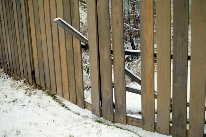 Wood fence maintenance during winter