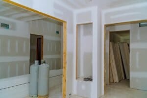 Do you need a building permit to drywall a basement