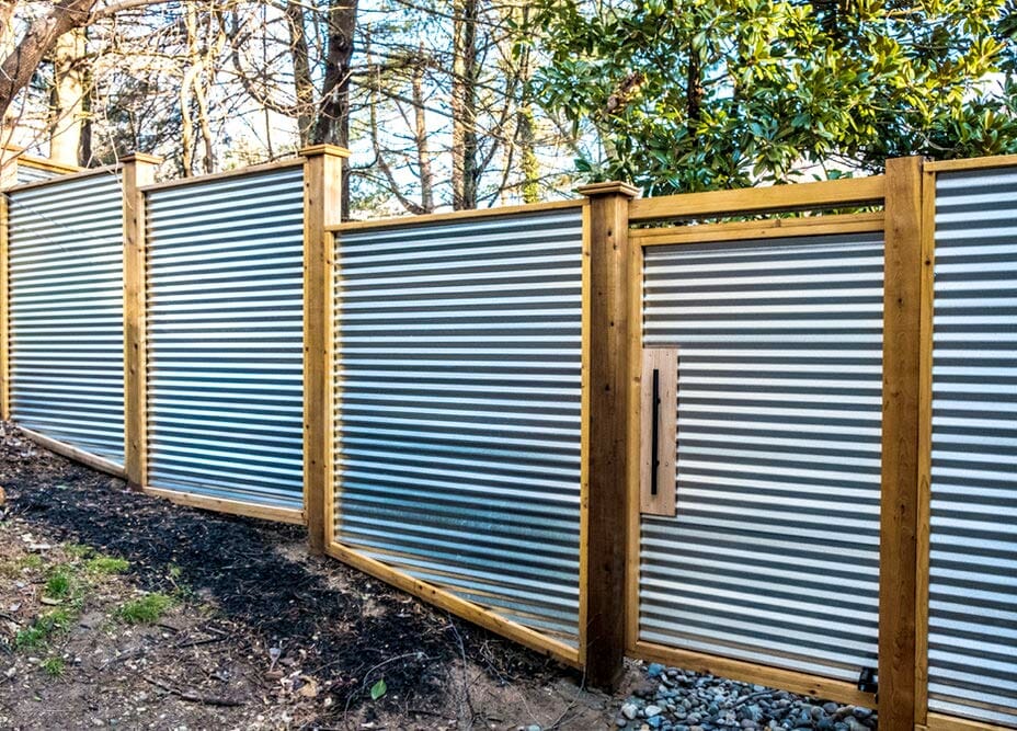 Corrugated metal fence with wooden frame