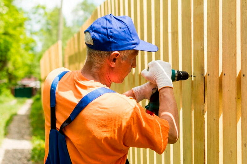 Is it cheaper to DIY or hire a pro to install a fence